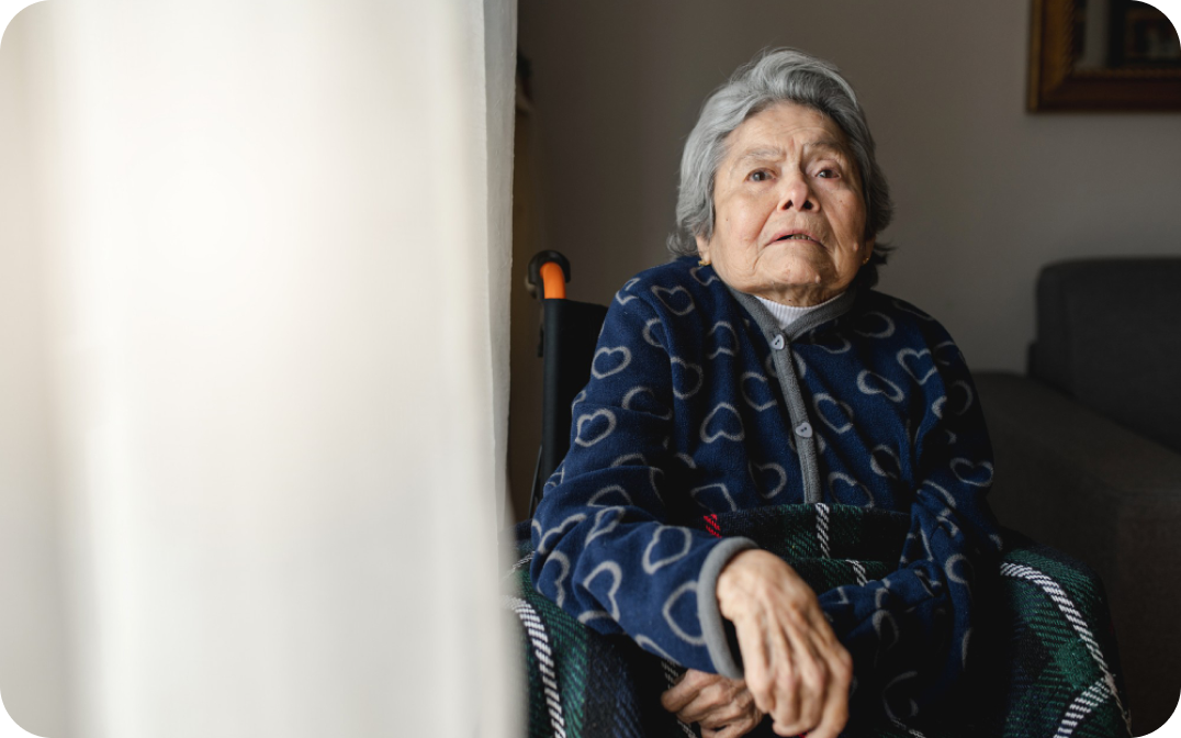 elderly woman sitting in a wheelchair